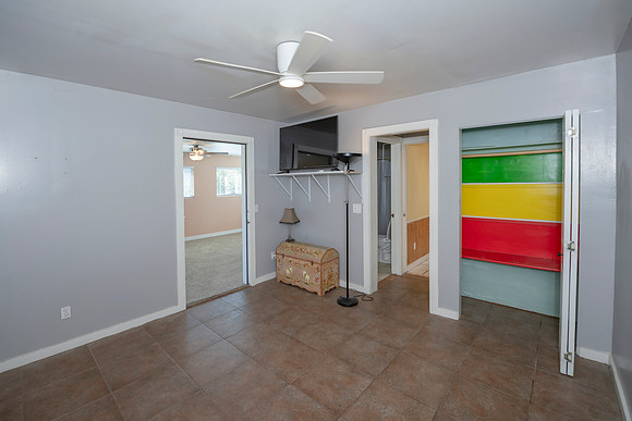a (26) guest room off of family room in back of home