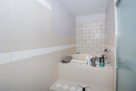 a (38) second master bath with shower and tub