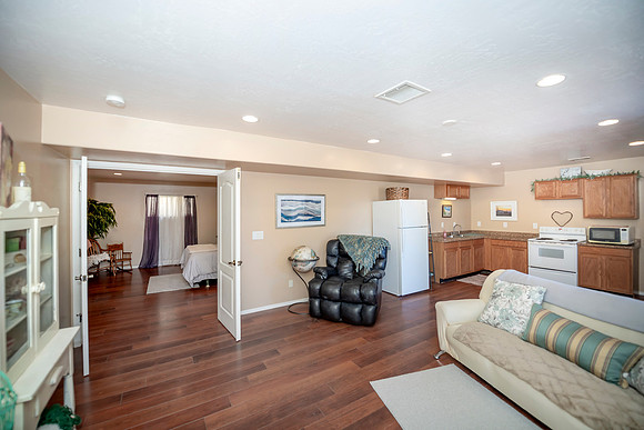 downstairs in law living room to large bedroom