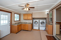 DSC_7743 laundry room leading to backyard