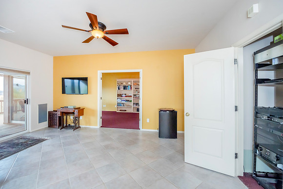 downstairs family room with media closet
