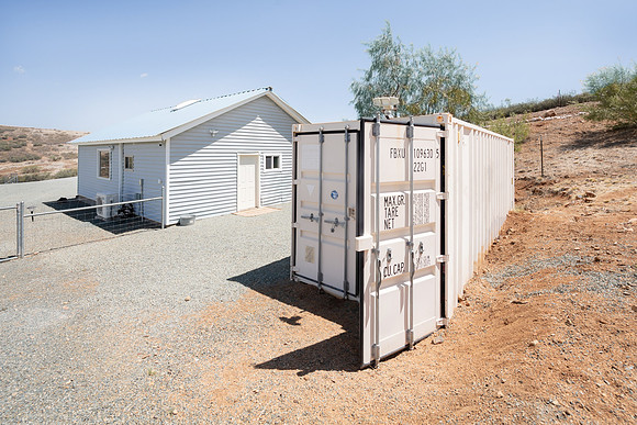 back of office and shipping container