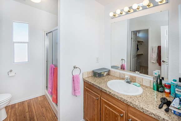 master bath split between large walk in closet